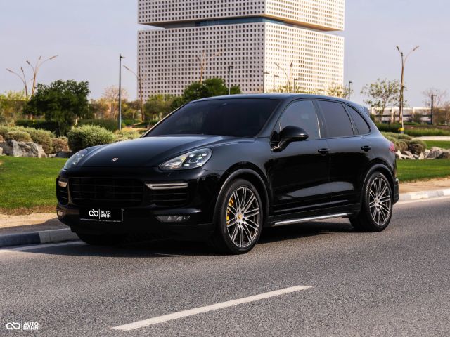 Used - Perfect Condition 2015 Porsche Cayenne Turbo V8 Black exterior with Red interior at Autobahn Automotive