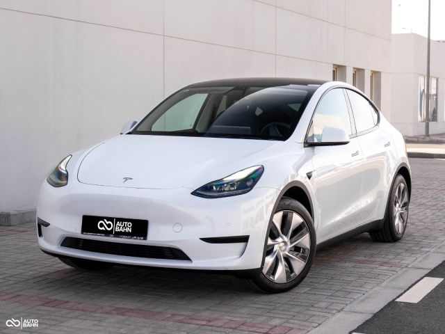 New 2023 Tesla Model Y White exterior with Black interior at Autobahn Automotive