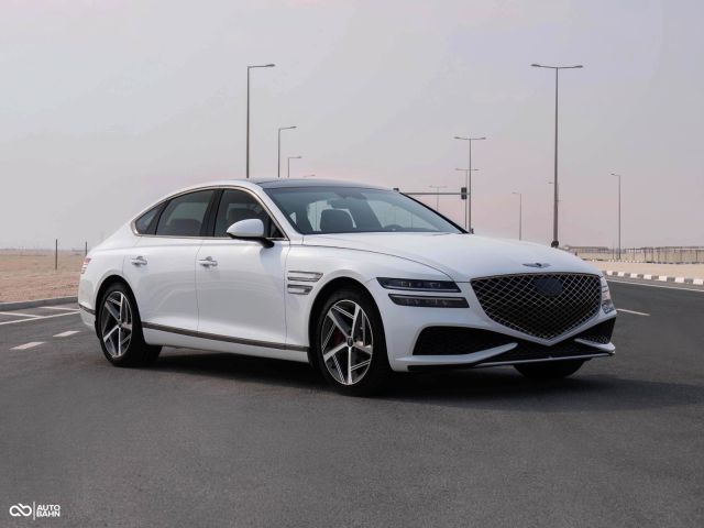 Used - Perfect Condition 2023 Genesis G80 3.5L Turbo White exterior with Red interior at Autobahn Automotive