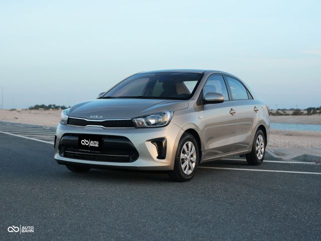 Used - Perfect Condition 2022 Kia Pegas Gold exterior with Grey interior at Autobahn Automotive
